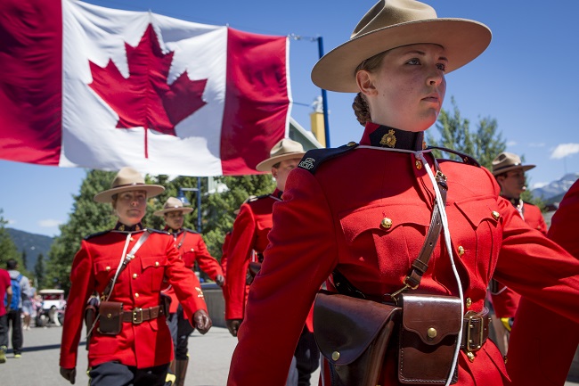 Mounties with canadian flag - Dissecting a Design: One of the most remarkable coins ever produced